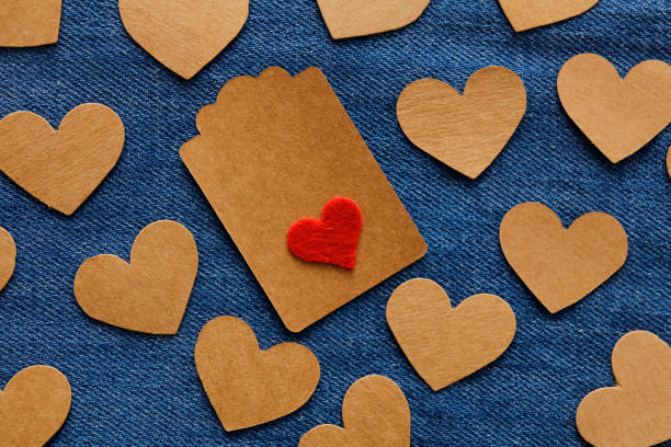 Heart shapes on jeans background