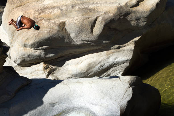 Puerto Vallarta, Mexico: A blindfolded man diving off a cliff at Chico’s Paradise, 40 km south of Puerto Vallarta.