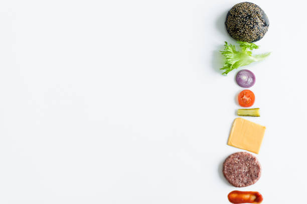 istock Ingredients for the black Burger over white background. 1144430566