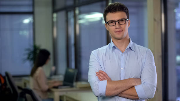 istock Confident young man posing on camera, applicant for vacancy, freelance job 1144431411