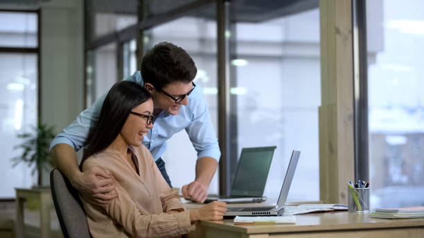 istock Cheerful coworkers satisfied with project result, successful teamwork in office 1144431425