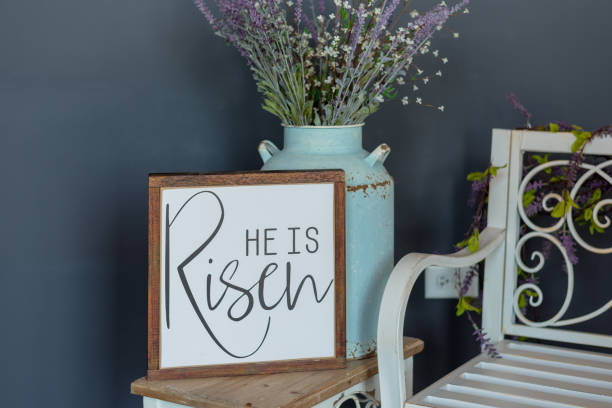 istock Easter background with sign that says “He is Risen” 1144440566