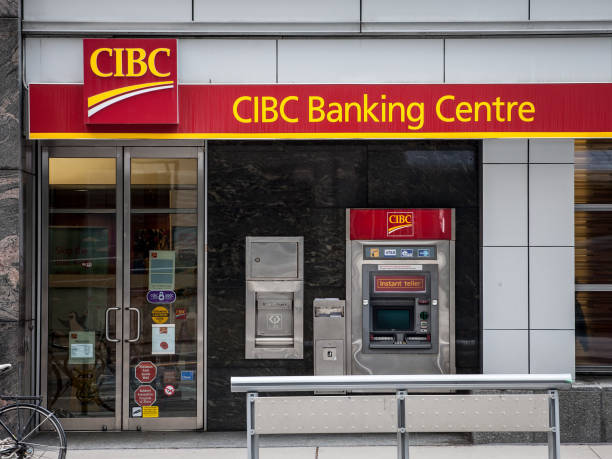CIBC logo with its ATM, in front of one of their banking center in Toronto. Called as well Canadian Imperial Bank of Commerce, it is one of main banks of America stock photo