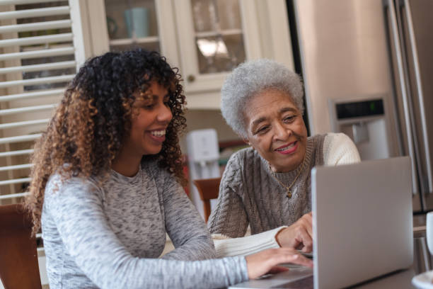 istock Senior woman learning how to use a laptop 1144444300