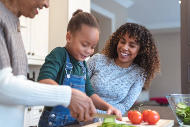 istock Family generations cooking together 1144444305