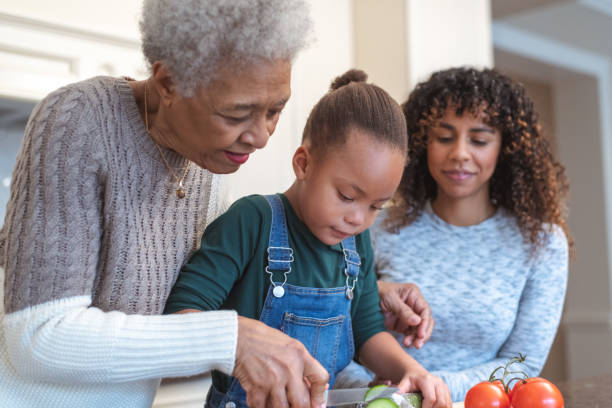 istock Family generations cooking together 1144444306