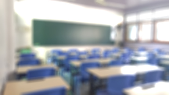 School Classroom In Blur Background Without Young Student Blurry View Of  Elementary Class Room No Kid Or Teacher With Chairs And Tables In Campus  Stock Photo - Download Image Now - iStock