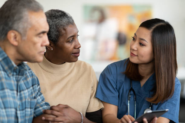 istock Sharing results with an elderly couple 1144444466