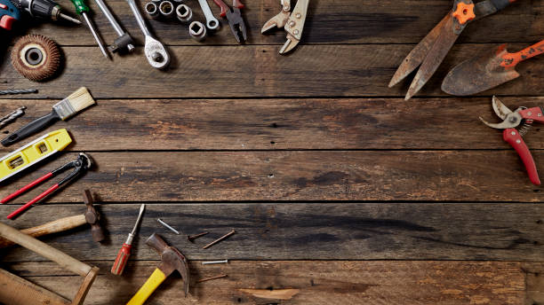 istock Empty chalkboard with many handy tools, on wooden background top view with copy space for text, 1144450550