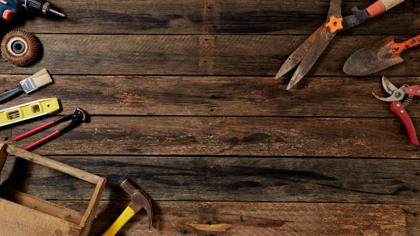 istock Empty chalkboard with many handy tools, on wooden background top view with copy space for text, 1144450556