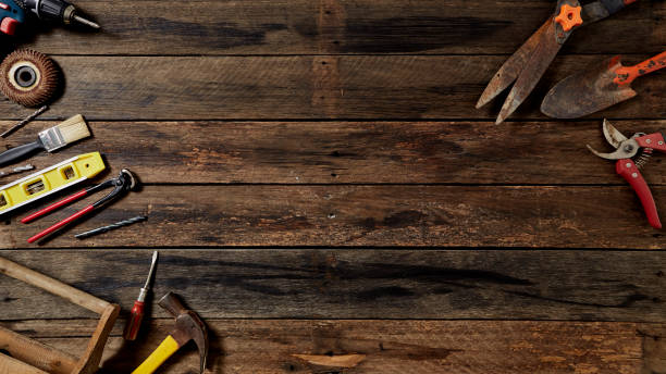 istock Empty chalkboard with many handy tools, on wooden background top view with copy space for text, 1144450557