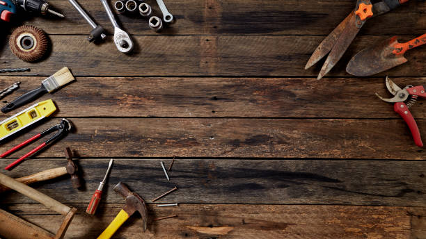 istock Empty chalkboard with many handy tools, on wooden background top view with copy space for text, 1144450564