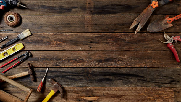 istock Empty chalkboard with many handy tools, on wooden background top view with copy space for text, 1144450579