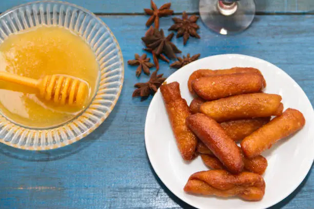 pestiños with port and honey typical of Spanish gastronomy