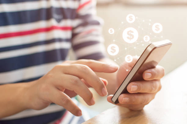 istock Close up image hand using mobile phone with online transaction application, Concept financial technology (fintech) 1144452699