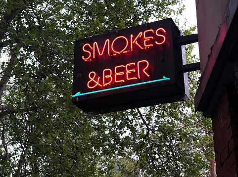 Smokes and beer neon sign.