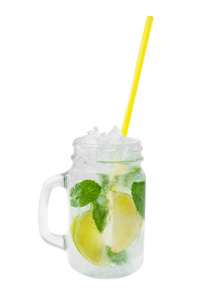 istock Summer drink with lime and mint isolated white 1144455293