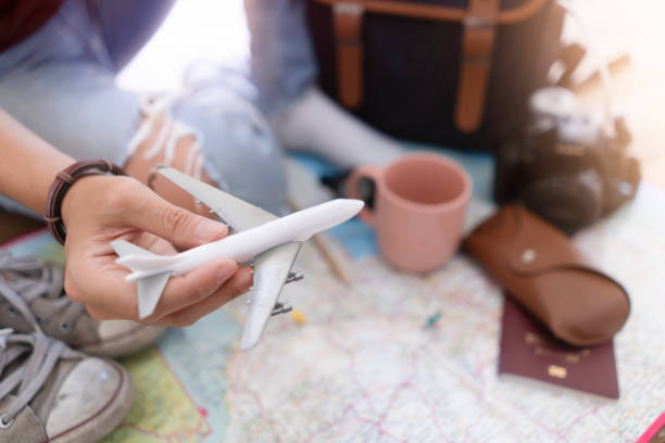 istock Hand to planning vacation trip and accessories for travel 1144460176