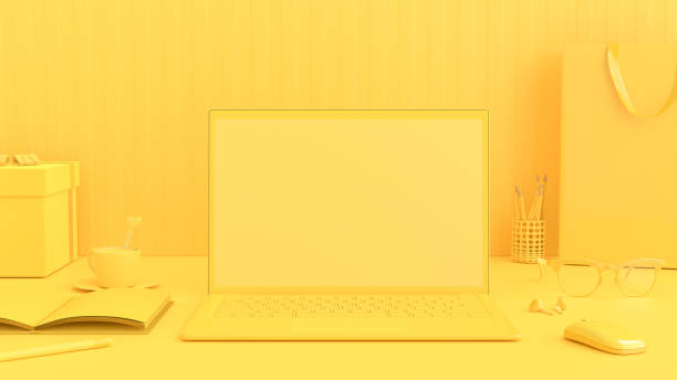 istock Minimal idea concept, Laptop on Work desk table yellow color 1144461370