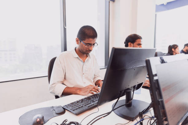 istock Staff at Work at a Busy Call Center 1144468399