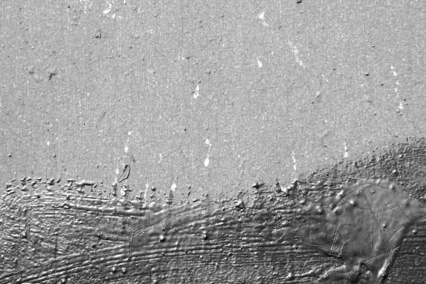 istock Old painted wall background texture close up. Black and white 1144474199