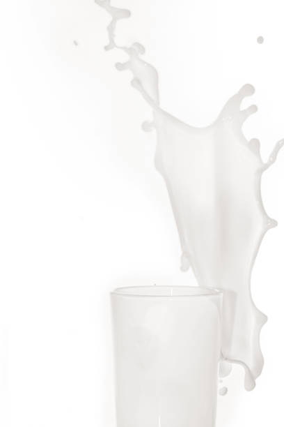 istock Glass cup with milk on a white background 1144476495