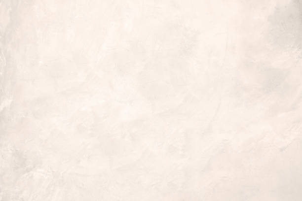 istock White pastel rough crack cement texture stone concrete,rock plastered stucco wall; painted flat fade background gray solid floor grain. 1144480009