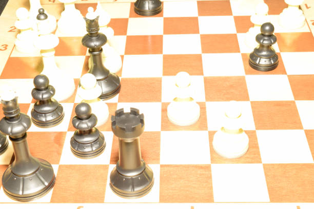istock Wooden chessboard with white pawns as a sport backdrop 1144480052