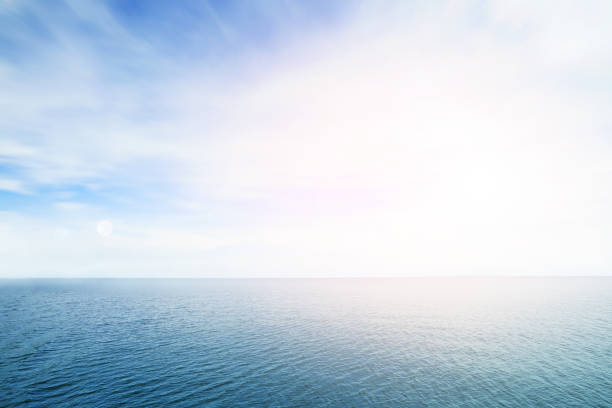 istock The blur cool sea background on horizon tropical sandy beach; relaxing outdoors vacation with heavenly mind view at a resort deck touching sunshine, sky surf summer clouds and light blue wave ocean. 1144481487