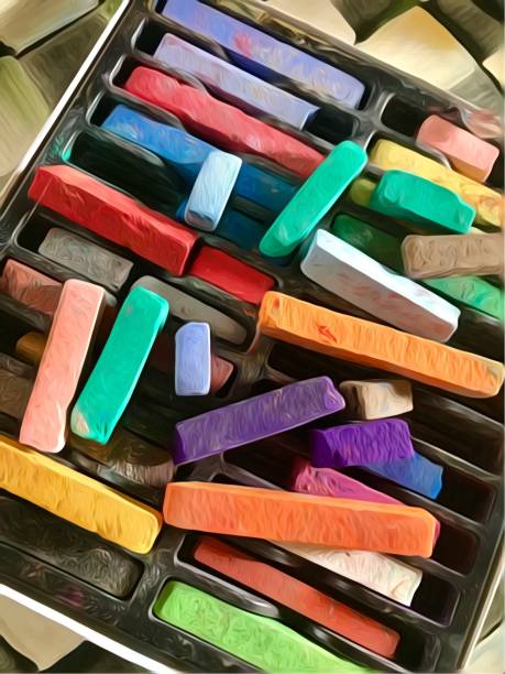 istock Art studio materials paint chalk brushes close up 1144483494