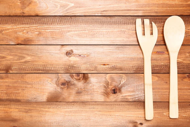 istock Wooden kitchen cutlery on brown table 1144486822
