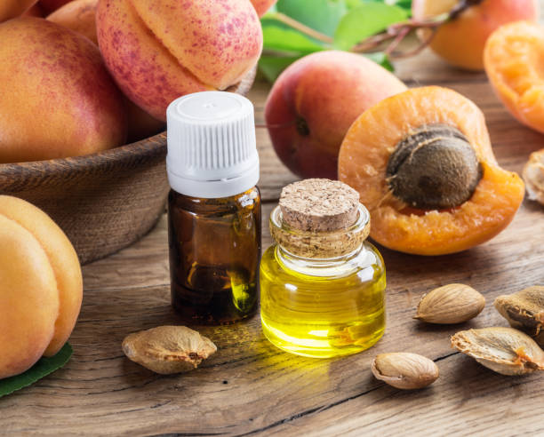 istock Apricot kernel oil and apricot kernels. 1144489339