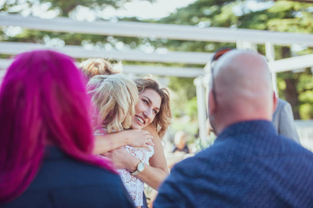 istock Smiling Married Lesbian Couple Hugging Outdoors 1144489414