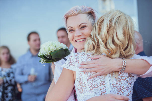 istock Happy Married Lesbian Couple Hugging 1144489415