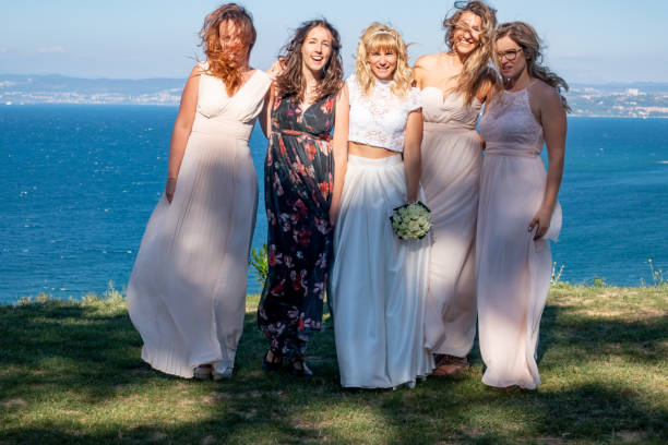 istock Bride With Her Wife and Bridesmaids 1144489417