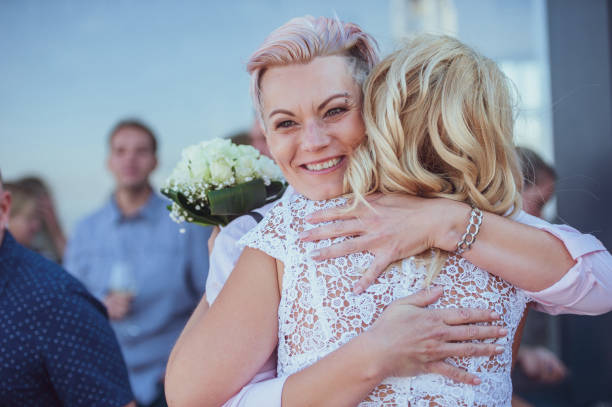 istock Happy Married Lesbian Couple Hugging 1144489425