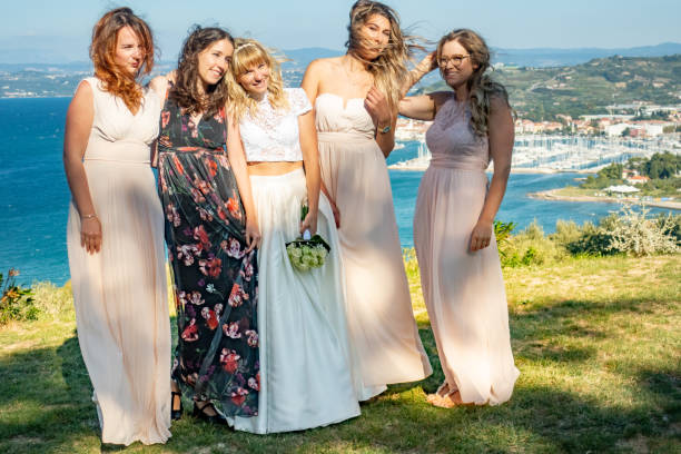 istock Bride With Her Wife and Bridesmaids 1144489426