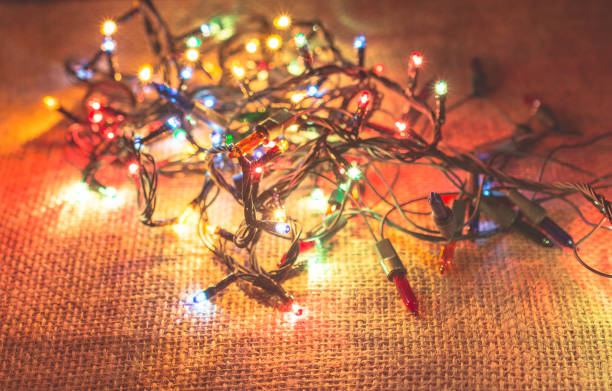 istock Christmas lights on a background on display 1144490053