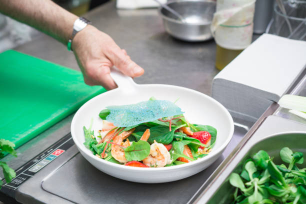 istock Fresh salad with king prawns and strawberries 1144493107