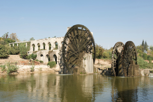 Photography on theme outstanding building beautiful brick old water mill, photo consisting of big brick old water mill outdoor in rural, brick old water mill situated on riverside country lifestyle