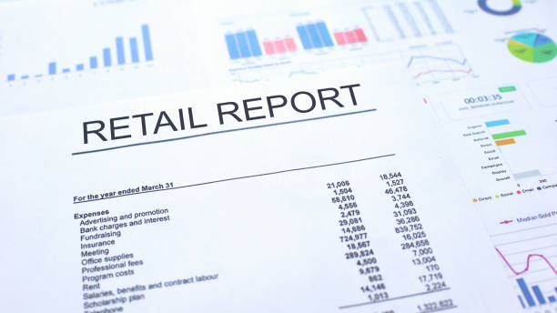 istock Retail report lying on table, graphs charts and diagrams, official document 1144494167