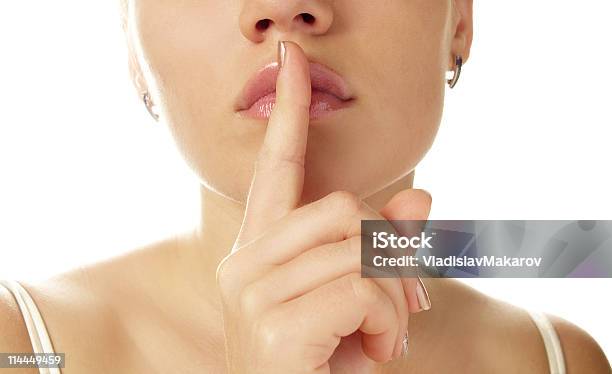 Woman Gestures For Silence Stock Photo - Download Image Now - Forbidden, Hands Covering Mouth, Adult