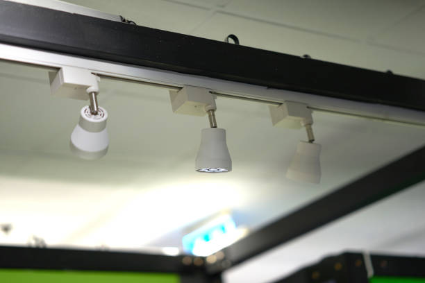 istock Spot light lamps installed on bar near ceiling 1144496870