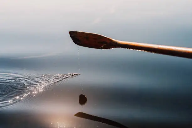 Photo of Oar rowing boat close up on a clear lake