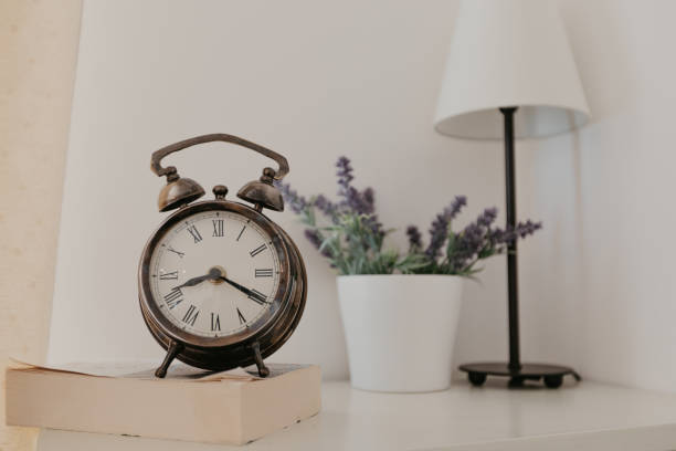 istock clock of vintage in room - Image 1144497804