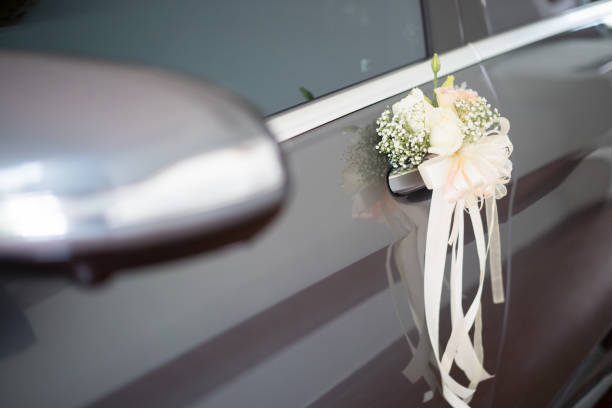 istock Floral wedding decoration on car 1144498661