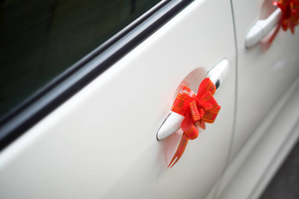istock Wedding car decoration red ribbon 1144498751