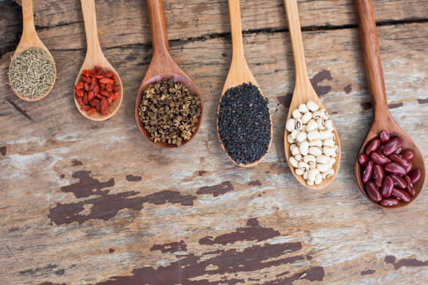 istock Cereal grains , seeds, beans,spices on wooden background. 1144499598