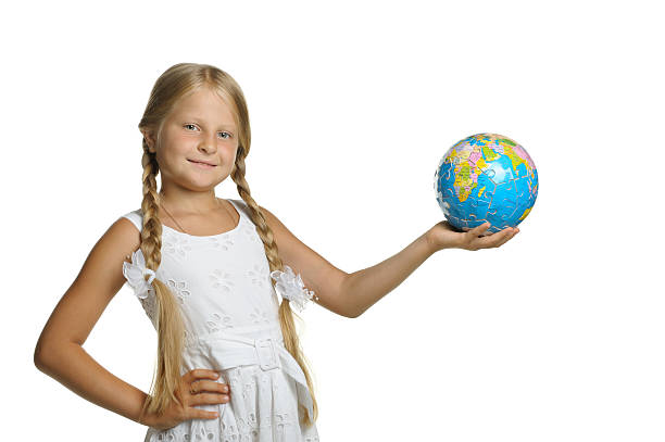 istock girl holds the globe collected from puzzle 114450049