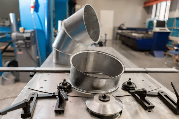 istock production rolling tool, electric machine. the production of ventilation and gutters. Tool and bending equipment for sheet metal. manufacture or a demonstration stand in the store 1144504706
